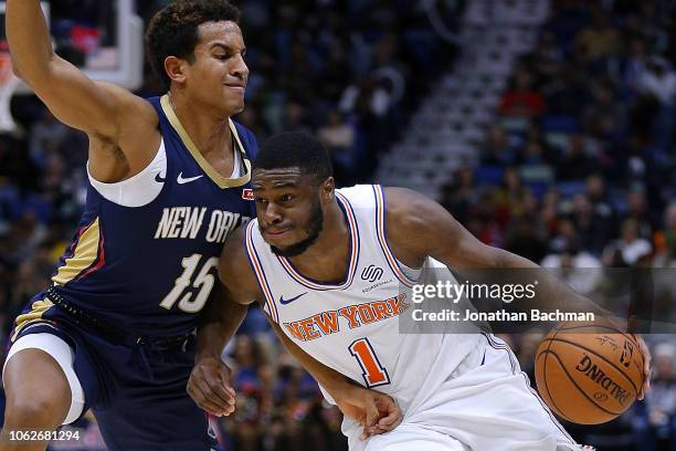 Emmanuel Mudiay of the New York Knicks drives against Frank Jackson of the New Orleans Pelicans during the second half at the Smoothie King Center on...