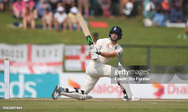 England batsman James Anderson sweeps to the boundary during Day Four of the Second Test match between Sri Lanka and England at Pallekele Cricket...