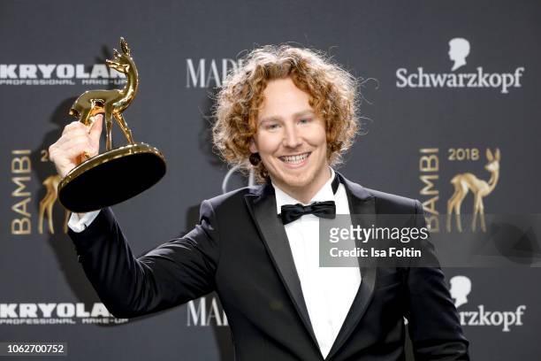 German singer and award winner Michael Schulte poses with award during the 70th Bambi Awards winners board at Stage Theater on November 16, 2018 in...