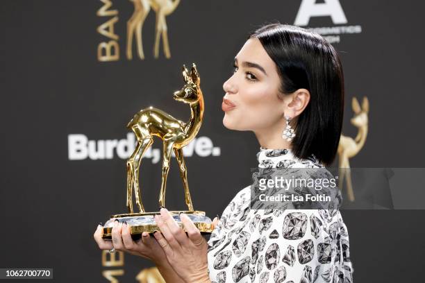 British singer and award winner Dua Lipa poses with award during the 70th Bambi Awards winners board at Stage Theater on November 16, 2018 in Berlin,...
