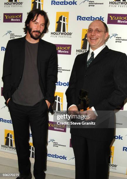 Keanu Reeves and Akiva Goldsman during 9th Annual Hollywood Film Festival Awards Gala Ceremony - Press Room at Beverly Hilton Hotel in Beverly Hills,...