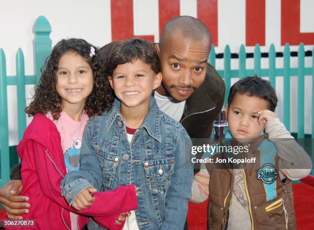 Donald Faison and children during "Chicken Little" Los Angeles Premiere - Arrivals at El Capitan Theater in Hollywood, California, United States.