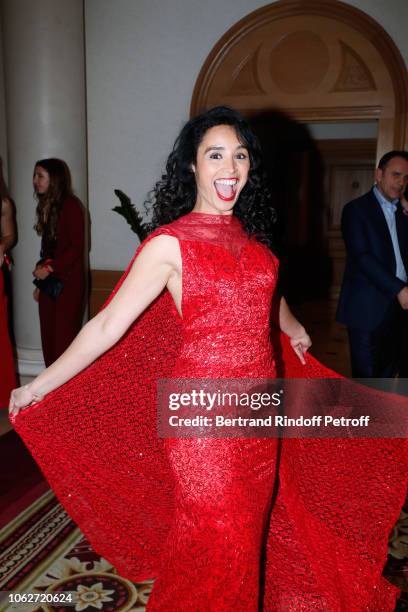 Journalist Aida Touihri, dressed by Albertine Taous, attends the "Sauvez le Coeur des Femmes - Red Defile" Show at Hotel Marriot on November 16, 2018...