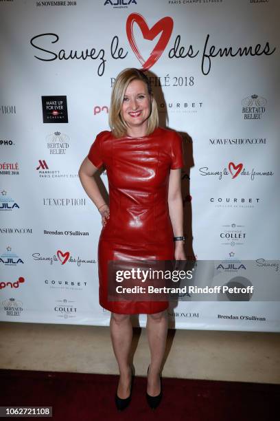 Journalist at BFMTV Karine de Menonville, dressed by Paule Ka, attends the "Sauvez le Coeur des Femmes - Red Defile" Show at Hotel Marriot on...