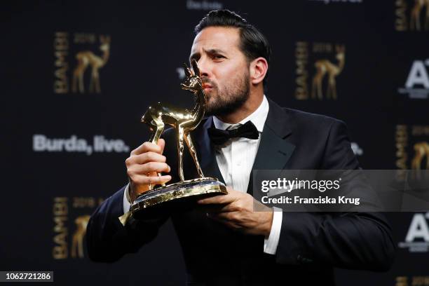 Claudio Pizarro poses with award during the 70th Bambi Awards winners board at Stage Theater on November 16, 2018 in Berlin, Germany.