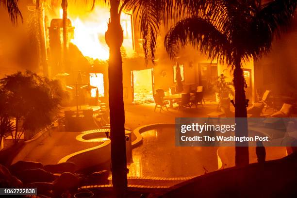 House burns during the Woolsey Fire in Malibu, California, November 9, 2018.