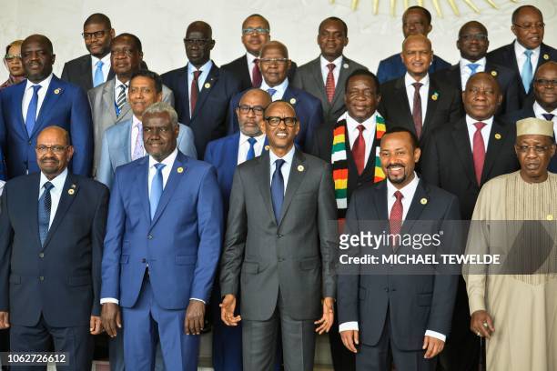 Africa Union Commission Chairperson, Moussa Faki Mahamat poses for a family photo on November 17, 2018 with Africa's Presidents Sudan's Omar...