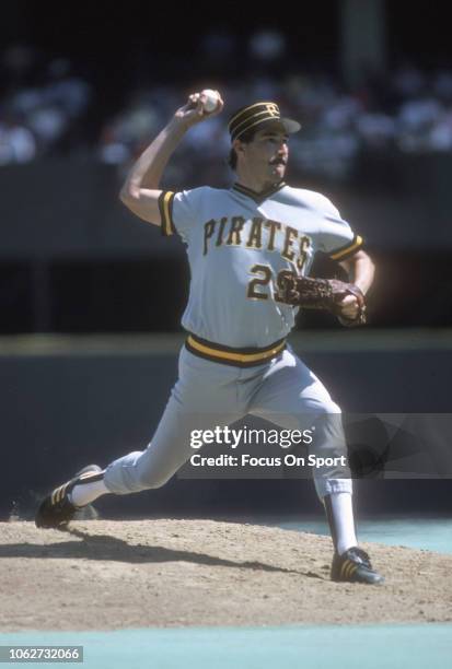 Rick Rhoden of the Pittsburgh Pirates pitches against the Philadelphia Phillies during a Major League Baseball game circa 1985 at Veterans Stadium in...