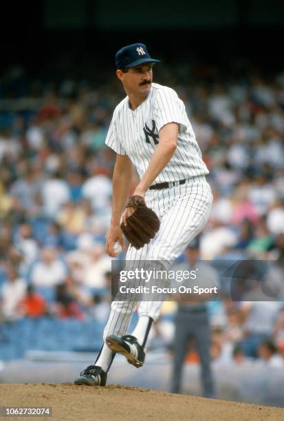 Rick Rhoden of the New York Yankees pitches during an Major League Baseball game circa 1987 at Yankee Stadium in the Bronx borough of New York City....