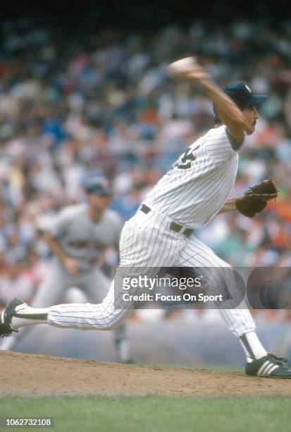 Rick Rhoden of the New York Yankees pitches during an Major League Baseball game circa 1987 at Yankee Stadium in the Bronx borough of New York City....