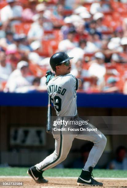 Benito Santiago of the Florida Marlins bats against the New York Mets during an Major League Baseball game circa 1993 at Shea Stadium in the Queens...