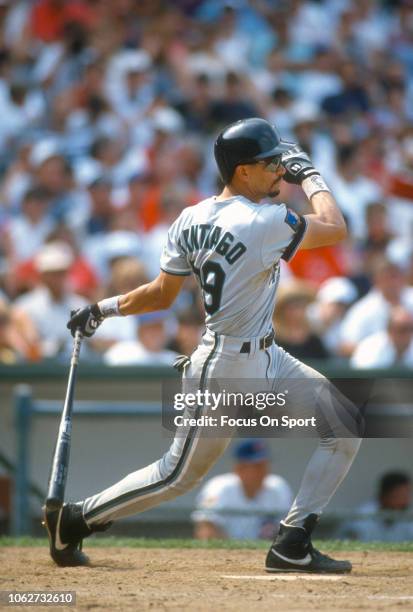 Benito Santiago of the Florida Marlins bats against the Chicago Cubs during an Major League Baseball game circa 1993 at Wrigley Field in Chicago,...