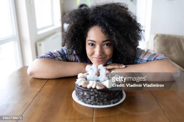 smiling woman and birthday cake with candles - 21st birthday stock pictures, royalty-free photos & images