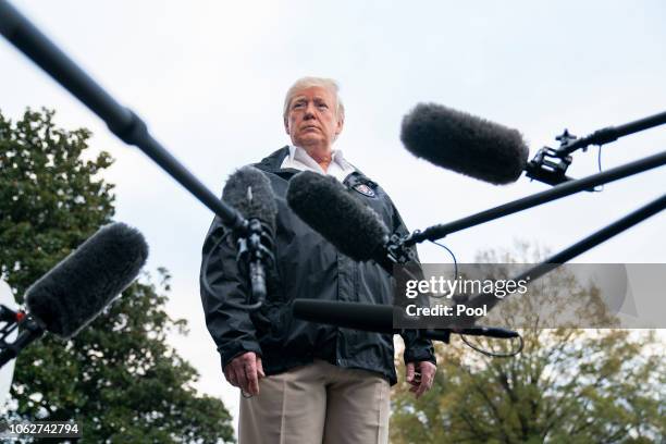 President Donald Trump speaks to the media before departing the White House for California, where he is scheduled to view damage from the state's...