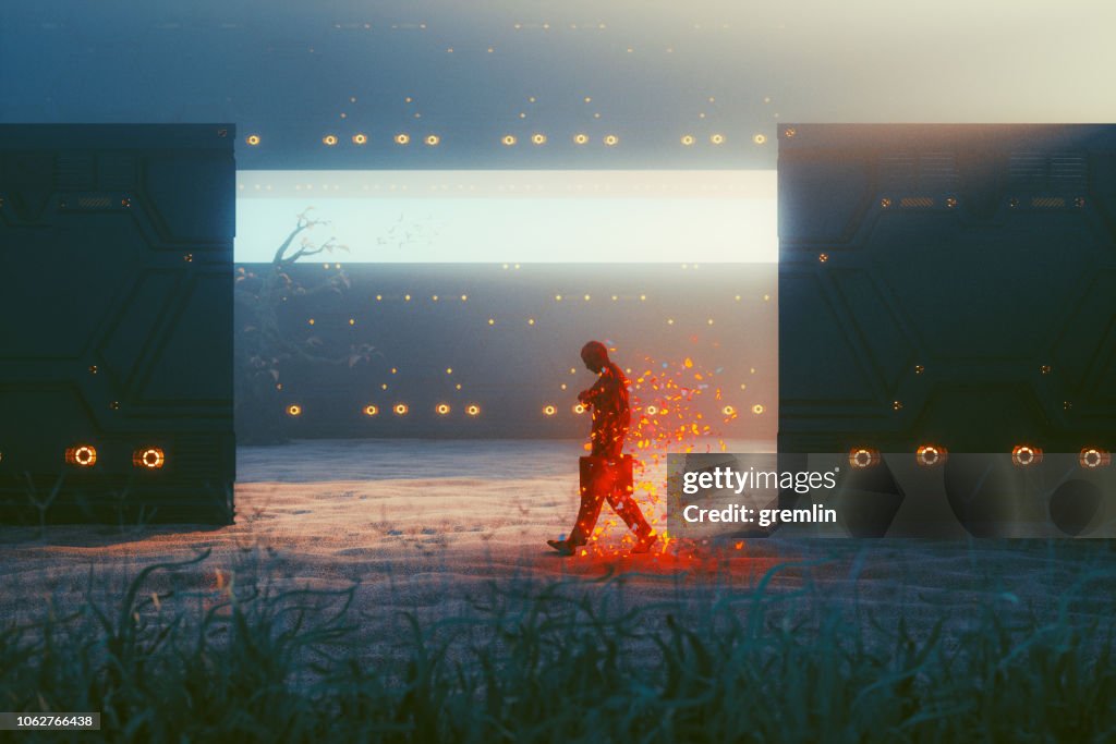 Businessman walking in surreal desert