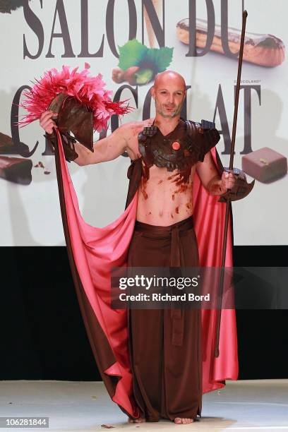 Ex Football player Franck Leboeuf, dressed by Vincent Guerlais and Les Garcons, walks the runway at the Salon Du Chocolat 2010 Opening Night at the...