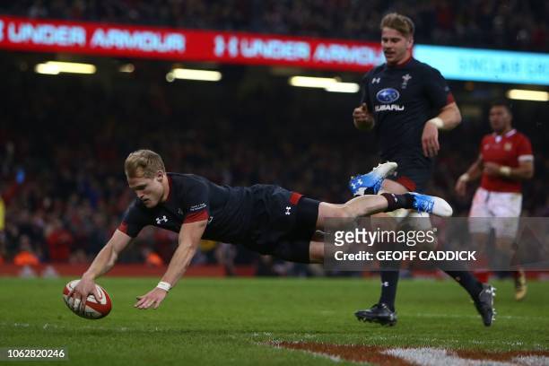 Wales' Aled Davies scores the team's seventh try during the autumn international rugby union test match between Wales and Tonga at the Principality...