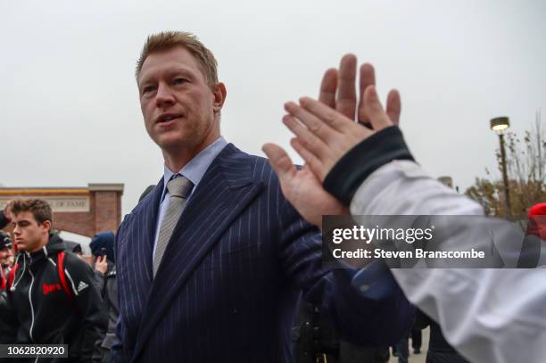 Head coach Scott Frost of the Nebraska Cornhuskers greets fans as the team arrives before the game against the Michigan State Spartans at Memorial...