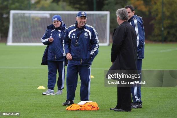 Carlo Ancelotti of Chelsea with Ex manager Guus Hiddink during a training session at the Cobham Training ground on October 28, 2010 in Cobham,...