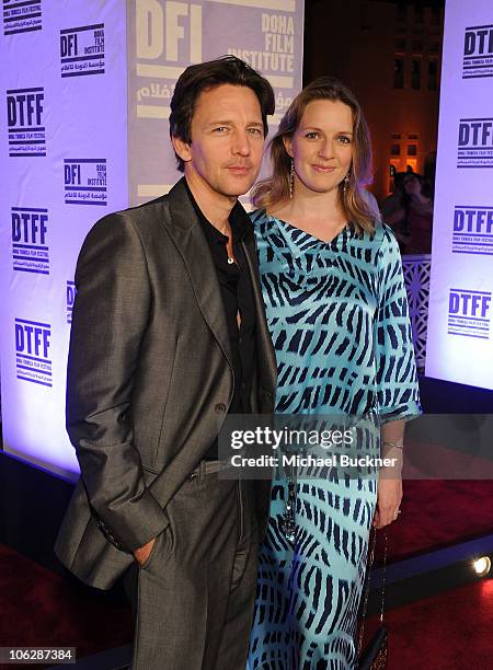 Actor Andrew McCarthy and Dolores Rice arrive at the "Miral" premiere during the 2010 Doha Tribeca Film Festival held at the Katara Opera House on...