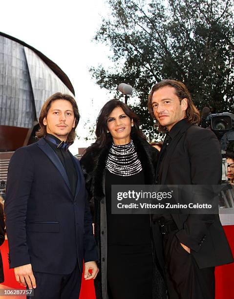 Actress Pamela Prati with Michele Malenotti and Manuele Malenotti attend the "Tron: Legacy" Premiere hosted by Belstaff during the 5th International...