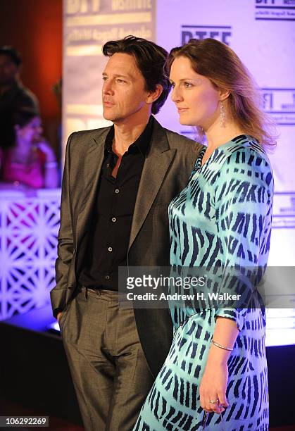 Actor Andrew McCarthy and Dolores Rice arrive at the "Miral" premiere during the 2010 Doha Tribeca Film Festival held at the Katara Opera House on...