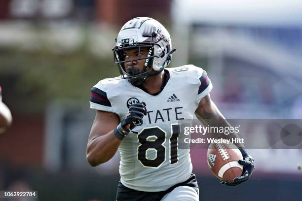 Justin Johnson of the Mississippi State Bulldogs runs the ball in the second half of a game against the Arkansas Razorbacks at Davis Wade Stadium on...