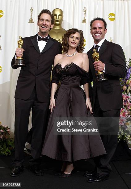 Actor-filmmakers Ray McKinnon, Lisa Blount and Walt Goggins with their Oscars for Best Live Action Short Film, "The Accountant"