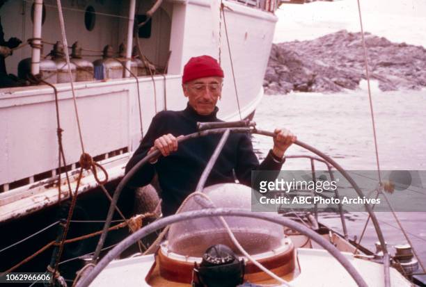 Jacques-Yves Cousteau aboard submarine, the RV Calypso off to the side, on 'The Undersea World of Jacques Cousteau'.