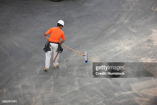 carpenter sweeping up after building - cleaning sawdust stock pictures, royalty-free photos & images