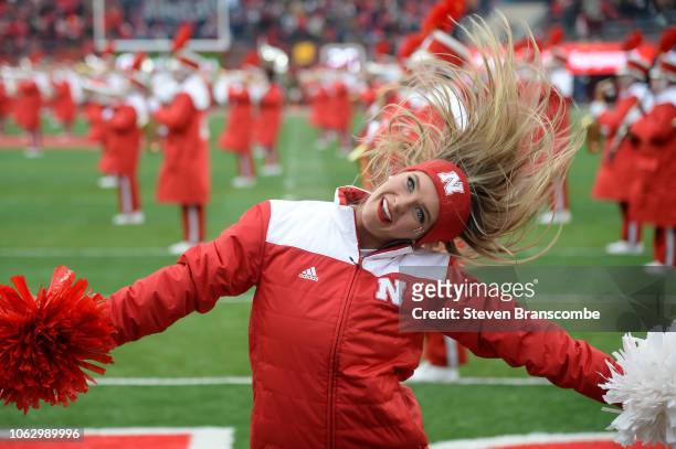 Cheerleader for the Nebraska Cornhuskers performs before the game against the Michigan State Spartans at Memorial Stadium on November 17, 2018 in...