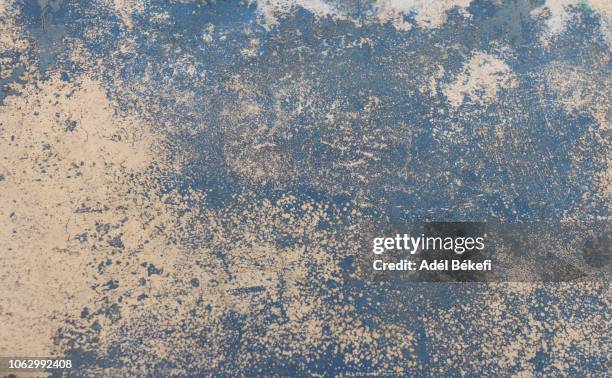 blue stained and worn wall - cement texture stock-fotos und bilder