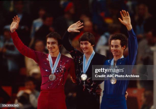 Lake Placid, NY Jan Hoffmann, Robin Cousins, Charles Tickner in medal ceremony for the Men's figure skating event at the 1980 Winter Olympics / XIII...