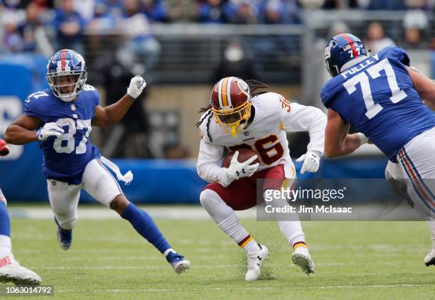 Swearinger of the Washington Redskins in action against Sterling Shepard and Spencer Pulley of the New York Giants on October 28, 2018 at MetLife...