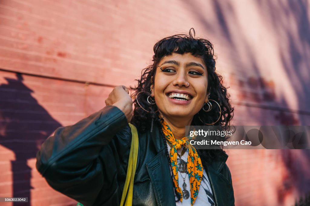 Young confident woman smiling
