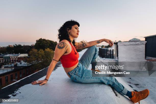 portrait of young woman on rooftop