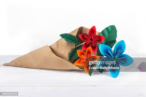 colorful origami flower bouquet - origami flower stock pictures, royalty-free photos & images