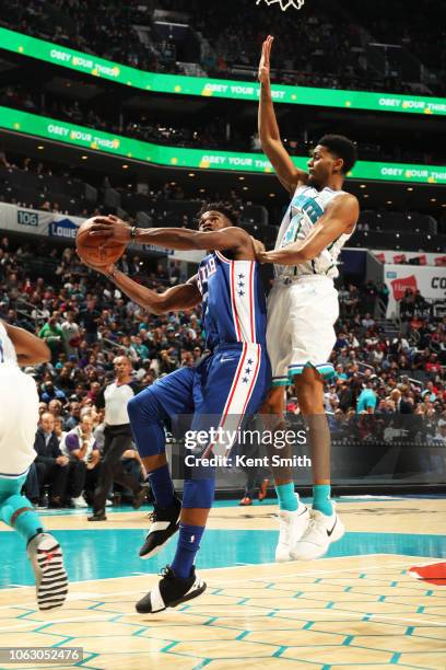 Jimmy Butler of the Philadelphia 76ers goes to the basket against the Charlotte Hornets on November 17, 2018 at Spectrum Center in Charlotte, North...