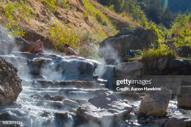 simmering in diamond fork hot springs - utah hot spring stock pictures, royalty-free photos & images