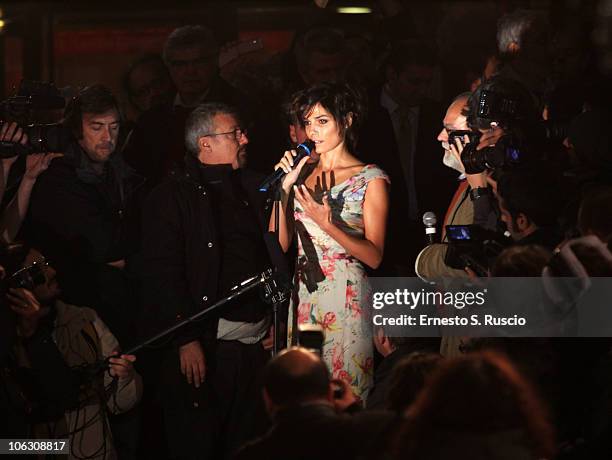 Valeria Solarino speaks as people protest on the red carpet during the opening of The 5th International Rome Film Festival at Auditorium Parco Della...