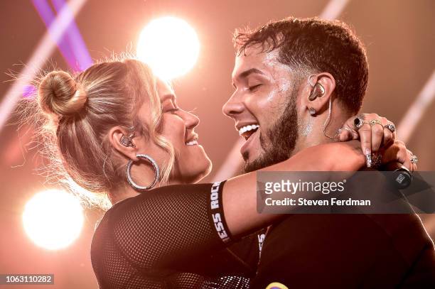 Karol G and Anuel AA perform live on stage during their concert at United Palace Theater on November 17, 2018 in New York City.