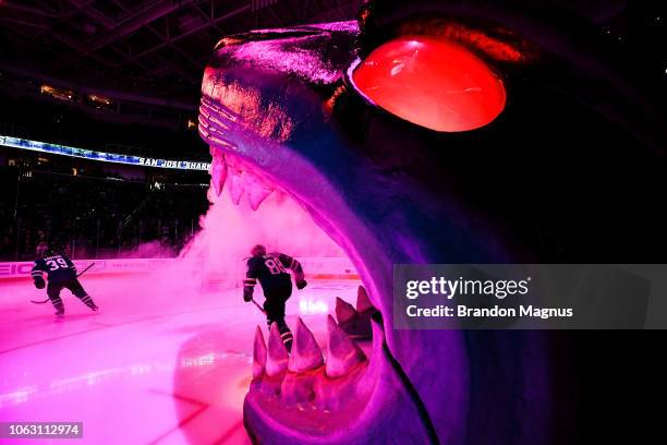 Logan Couture and Brent Burns of the San Jose Sharks takes the ice against the St Louis Blues at SAP Center on November 17, 2018 in San Jose,...