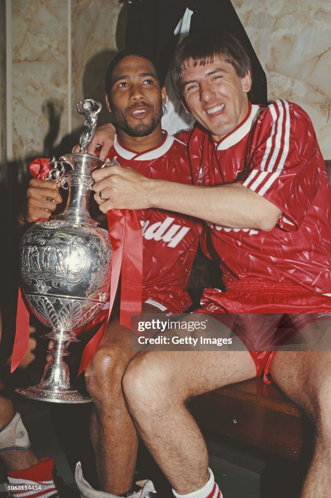 John Barnes and Peter Beardsley with First Division Trophy 1990