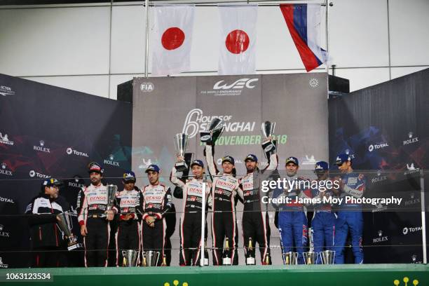 The podium : The Toyota Gazoo Racing drivers Sebastien Buemi, Kazuki Nakajima, and Fernando Alonso, second; the Toyota Gazoo Racing drivers Mike...