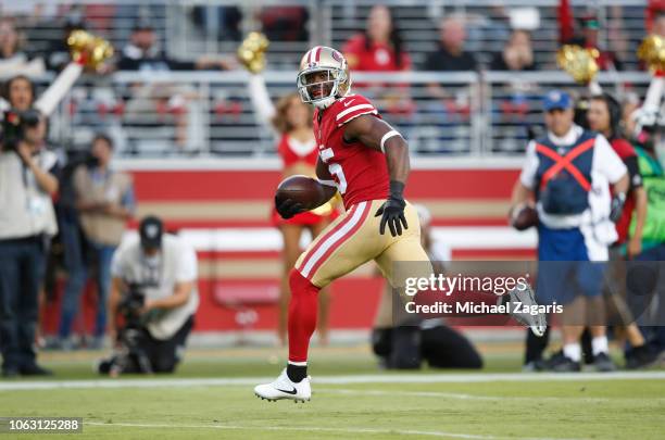 Pierre Garcon of the San Francisco 49ers makes a receptions and takes it to the end zone for a 24-yard touchdown during the game against the Oakland...