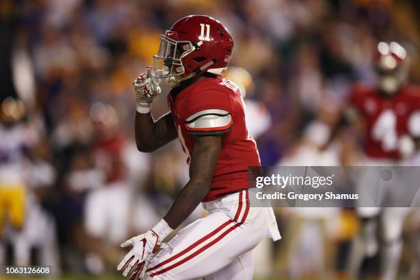 Henry Ruggs III of the Alabama Crimson Tide celebrates his touchdown in the first quarter of their game against the LSU Tigers at Tiger Stadium on...