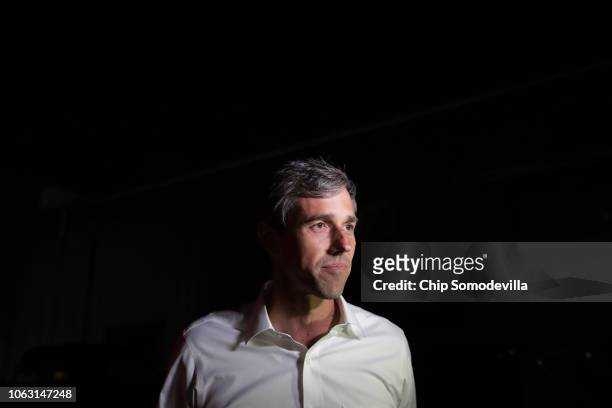 Senate candidate Rep. Beto O'Rourke talks with reporters before addressing a Blockwalk Celebration at Good Records after a day of door-to-door...