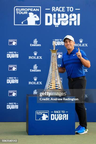 Francesco Molinari of Italy poses with the Race to Dubai trophy following the final round of the DP World Tour Championship at Jumeirah Golf Estates...