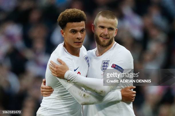 England's midfielder Dele Alli and England's midfielder Eric Dier celebrate on the pitch after the international UEFA Nations League football match...