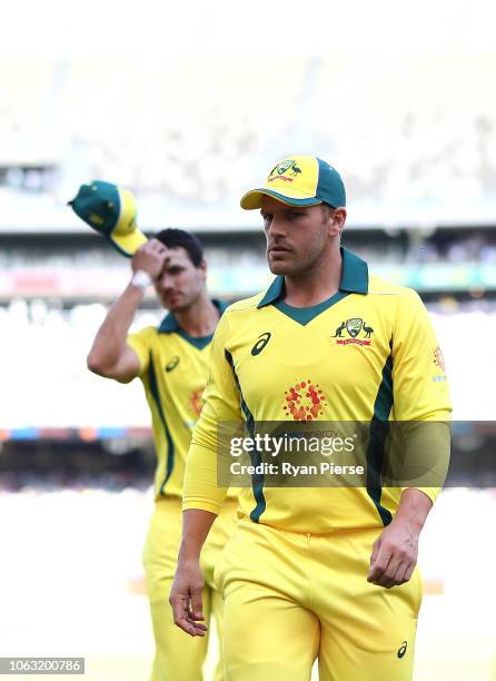 Aaron Finch of Australia and Nathan Coulter-Nile of Australia walk from the ground at the tea break during game one of the Gillette One Day...